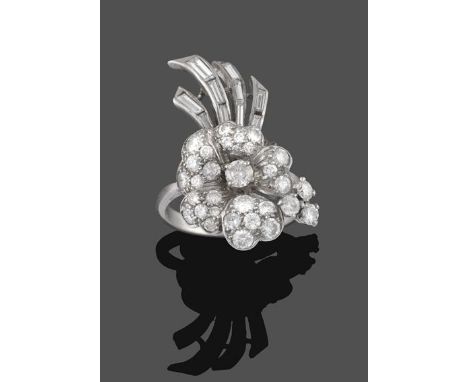 A Diamond Floral Spray Ring, realistically modelled as a flower, set throughout with round brilliant cut and baguette cut dia