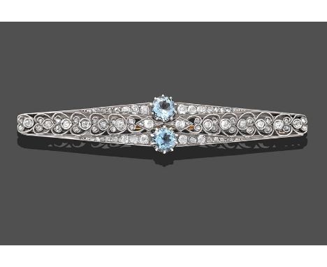 An Aquamarine and Diamond Bar Brooch, two round brilliant cut aquamarines centre a bar with old cut and rose cut diamonds in 