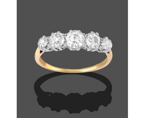 A Diamond Five Stone Ring, the graduated old cut diamonds in white claw settings, to a yellow tapered shoulder plain polished