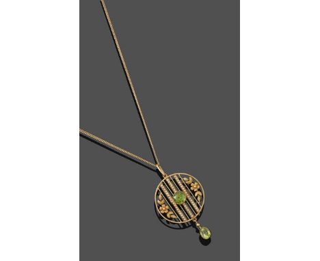 An Edwardian Peridot and Seed Pearl Pendant, the yellow circular openwork floral design with a round cut peridot in a millegr