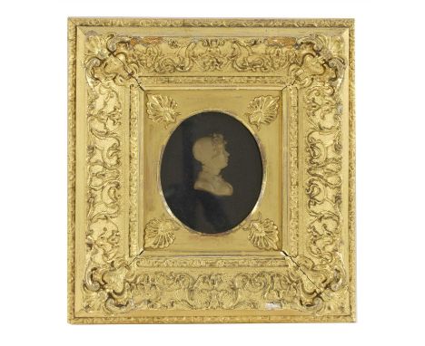 A pair of wax portrait busts 19th century, of a male and a female, each within a scrolling gilt frame, 13 x 10cm (2)