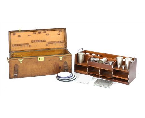 An Asprey &amp; Co. motoring picnic hamper, early 20th century, the leather clad case with lacquered brass interior, complete