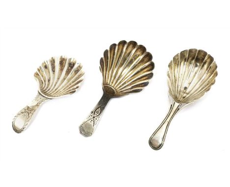 A silver caddy spoon, Hester Bateman, London 1788, with shell moulded bowl and bright cut decoration, together with a further