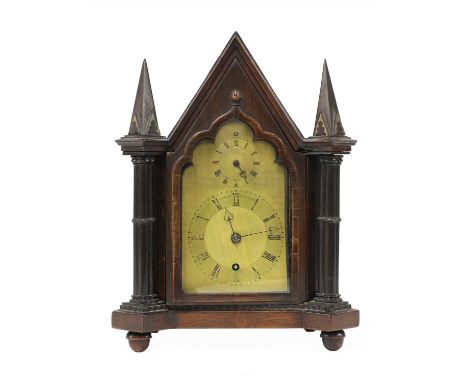 A Gothic Revival rosewood mantel clock by Perry Webster, retailed by 'Payne &amp; Co, New Bond Street', fitted repeating bell