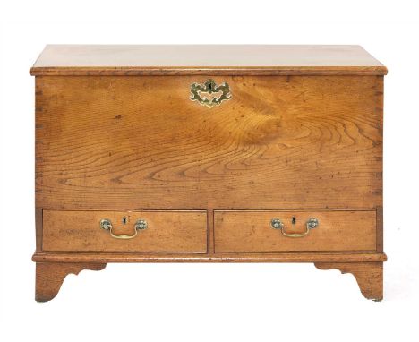 A George III fruitwood mule chest, the lifting lid over two drawers, and on bracket feet, 93cm wide 49cm deep 64cm high