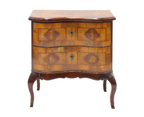 A walnut petit commode, South German or North Italian, 19th century, the concave serpentine front with two drawers, on scroll