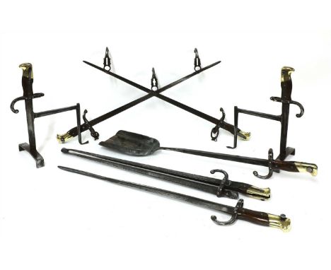 A set of bayonet fire tools, 19th century, comprising a poker, shovel and tongs, together with a pair of matching andirons, a