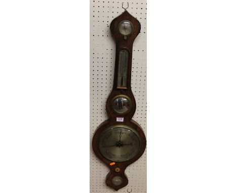 An early 19th century rosewood onion topped four dial wheel barometer, the lower silvered dial signed Chenery, Olland Street,