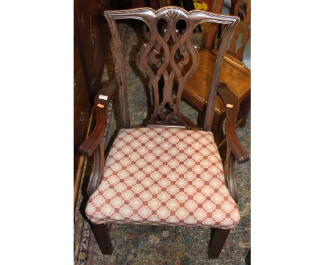 A 19th century Chippendale style mahogany elbow chair, together with a further 19th century fruitwood Chippendale splat back 