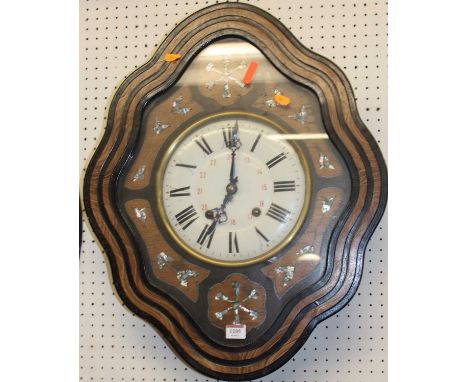 A late 19th century French floral mother of pearl inlaid vineyard clock, of typical shaped form with circular white enamel 9"