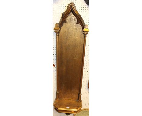 A late 19th century giltwood Gothic Revival wall mounted sculpture stand, (lacking finial and gallery) height 130cm
