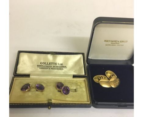 A pair of 9ct gold cufflinks; together with a pair of amethyst and gold cufflinks