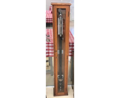 A mahogany-cased stick barometer