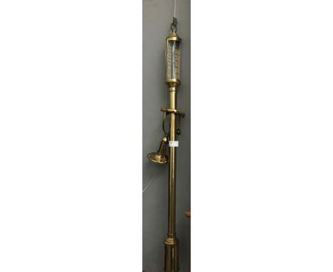 A brass gimble mount barometer