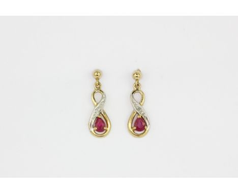 A pair of 9ct yellow gold ruby and diamond set drop earrings, L. 1.8cm.