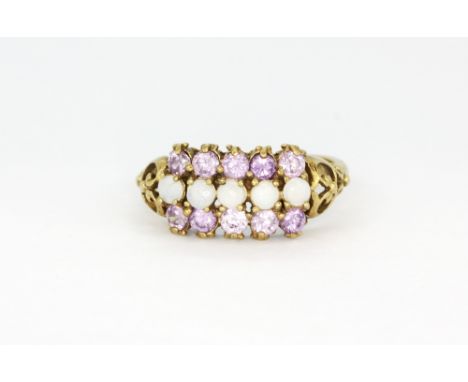 A 9ct yellow gold amethyst and opal set ring, (Q.5).