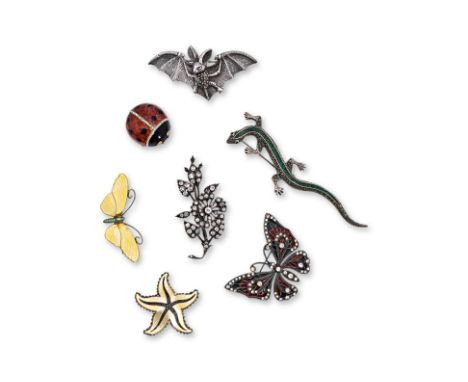 A GROUP OF SEVEN SILVER AND ENAMEL BROOCHES
Comprising: a Norwegian yellow enamel starfish, mark of Ivar Holth; a butterfly, 