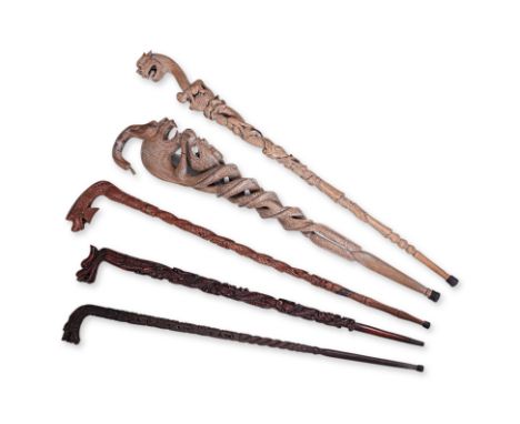 A GROUP OF FIVE DRAGON WALKING STICKS
All five carved from various timbers, includes a large example with two intertwined dra