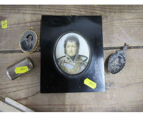 A hallmarked silver snuff box, together with a Continental silver caddy spoon, a locket brooch and a print miniature of a Mil