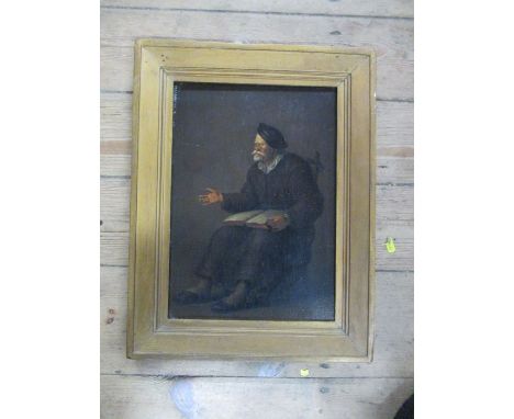 A 19th century oil on panel, portrait of a seated man teaching from an open book, 14ins x 10ins
