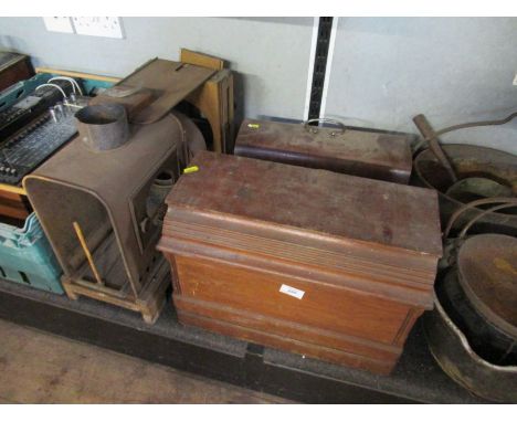 Two sewing machines and a magic lantern
