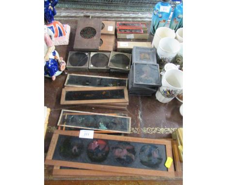 A collection of Victorian and later Magic lantern slides to include mahogany framed examples stamped Millikin &amp; Lawley 16