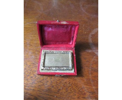 A William IV silver gilt vinaigrette, the lid with raised floral scroll border, engine turned, cartouche engraved 'Phyllis'; 