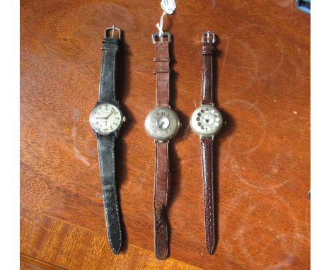 A World War One silver cased half hunter wrist watch, with enamel dial, together with another silver cased wrist watch with s