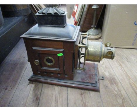 A 19th century magic lantern, in metal and mahogany&nbsp;