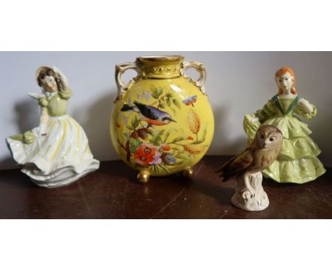 A Royal Worcester moon flask vase, decorated with birds and foliage to a yellow ground, together with two Royal Worcester fig