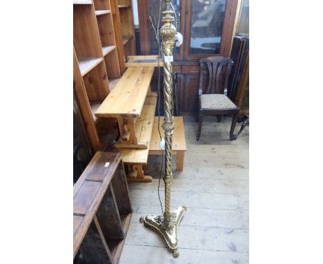 A brass standard lamp