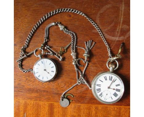 A silver plated pocket watch, the enamel dial with Roman numerals, subsidiary dial, marked 2615615, together with a silver gr