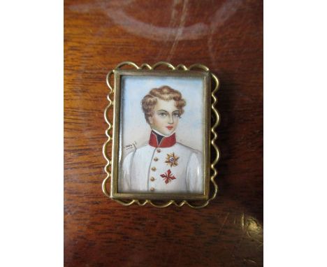 A portrait rectangular miniature, of a young officer in white jacket, signed, in gilt metal brooch mount, approx.&nbsp; 4cm x