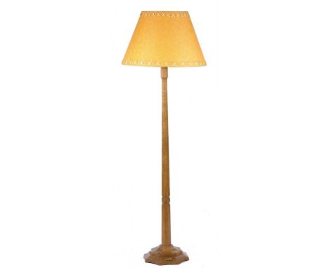 A MOUSEMAN OAK STANDARD LAMP, SECOND HALF 20TH C   the slightly tapered, adzed octagonal pillar on stepped foot  137cm h carv
