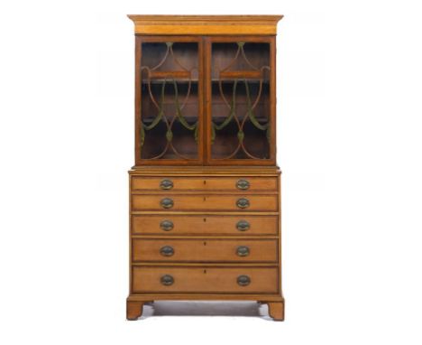 A GEORGE III SATINWOOD SECRETAIRE BOOKCASE, C1810 crossbanded and  inlaid, with scrolling foliage, having adjustable shelves 