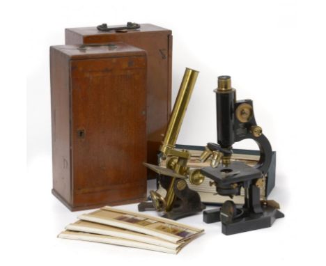 A BRASS MICROSCOPE R & J BECK LTD STANDARD LONDON MODEL 1, C1920 with several accessories, in mahogany box and two contempora