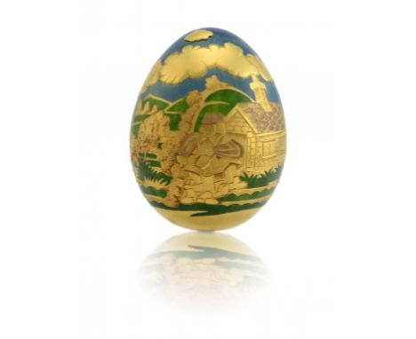 THE GIANT. A 22CT GOLD AND TRANSLUCENT ENAMEL CONUNDRUM EGG FOR CADBURY'S   designed by Alex Styles, 8cm h, by Garrard & Co L