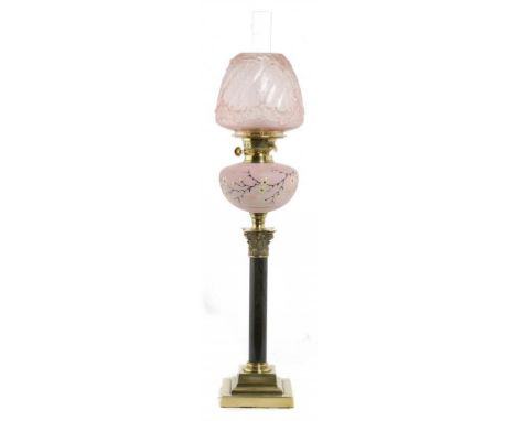 A VICTORIAN BRASS MOUNTED LIMESTONE COLUMNAR OIL LAMP, C1880 with prunus enamelled pink satin glass fount and brass Duplex bu