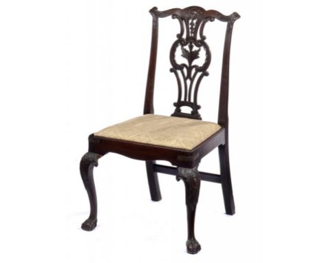 A GEORGE II CARVED MAHOGANY DINING CHAIR, BASED ON A DESIGN BY THOMAS CHIPPENDALE, C1760 with slip seat, on cabriole forelegs