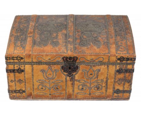 A GEORGE I BRASS STUDDED AND SCARLET OX HIDE OR RUSSIA LEATHER COVERED TRAVELLING TRUNK, C1730  the domed lid with twin crown