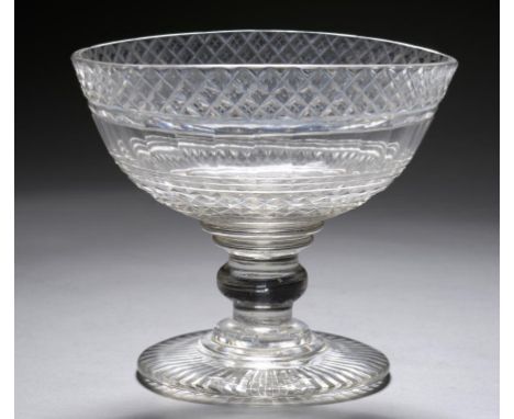 AN ANGLO IRISH CUT GLASS PEDESTAL BOWL, EARLY 19TH C  the faceted oval bowl between diamond cut bands, on heavy knopped stem 