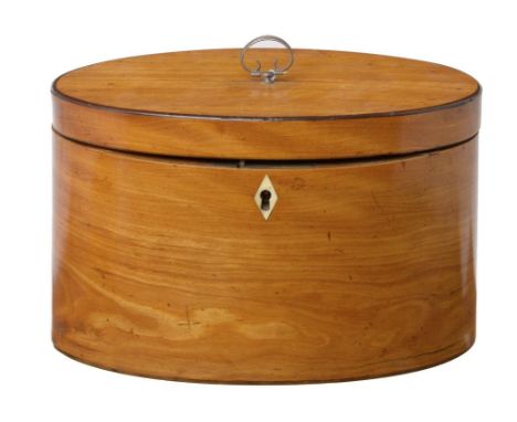 A SATINWOOD TEA CADDY, 19TH C  of plain oval shape, the divided interior with pair of covers, brass lock and hinge, ivory kit