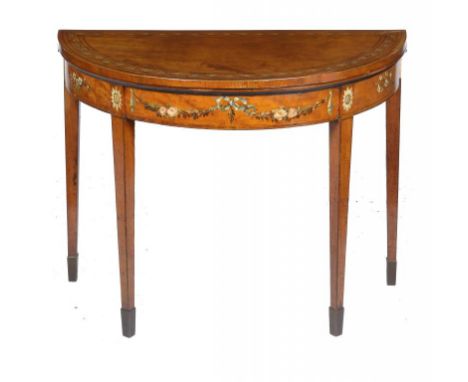 A GEORGE III  PAINTED SATINWOOD CARD TABLE, C1800  crossbanded and line inlaid, the fold-over top and frieze painted with fol