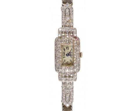 AN ART DECO DIAMOND COCKTAIL WATCH  with strap lugs, pavé set, in platinum, with rounded case back, on white gold mesh strap,