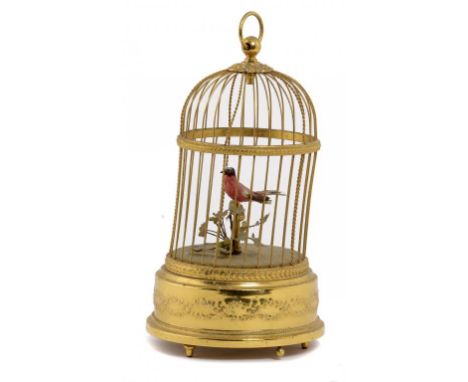 A SWISS GILT BRASS SINGING BIRD-IN-A-CAGE AUTOMATON, 20TH C with clockwork mechanism in cylindrical base, 30cm h, marked Roug