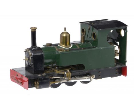 A SCRATCH BUILT LIVE STEAM MODEL 0-6-0 LOCOMOTIVE  with brass fittings and cab detail, including pressure gauge and whistle, 