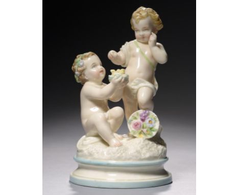 A ROYAL WORCESTER GLAZED AND TINTED PARIAN BOYS AND NEST GROUP, 1862-7  impressed mark++Fine condition