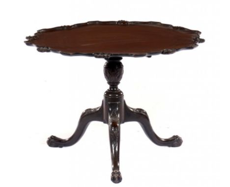 A GEORGE II STYLE CARVED MAHOGANY TRIPOD TABLE  the top with  pierced shell border on reduced pillar and claw and ball feet, 