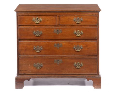 A WALNUT CHEST OF DRAWERS, 18TH C  the top with cavetto edge moulding, the drawers with pierced brass furniture, raised and f