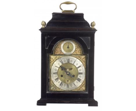 A GEORGE III EBONISED BRACKET CLOCK, LATE 18TH C the breakarched brass dial with engraved date and false pendulum apertures, 